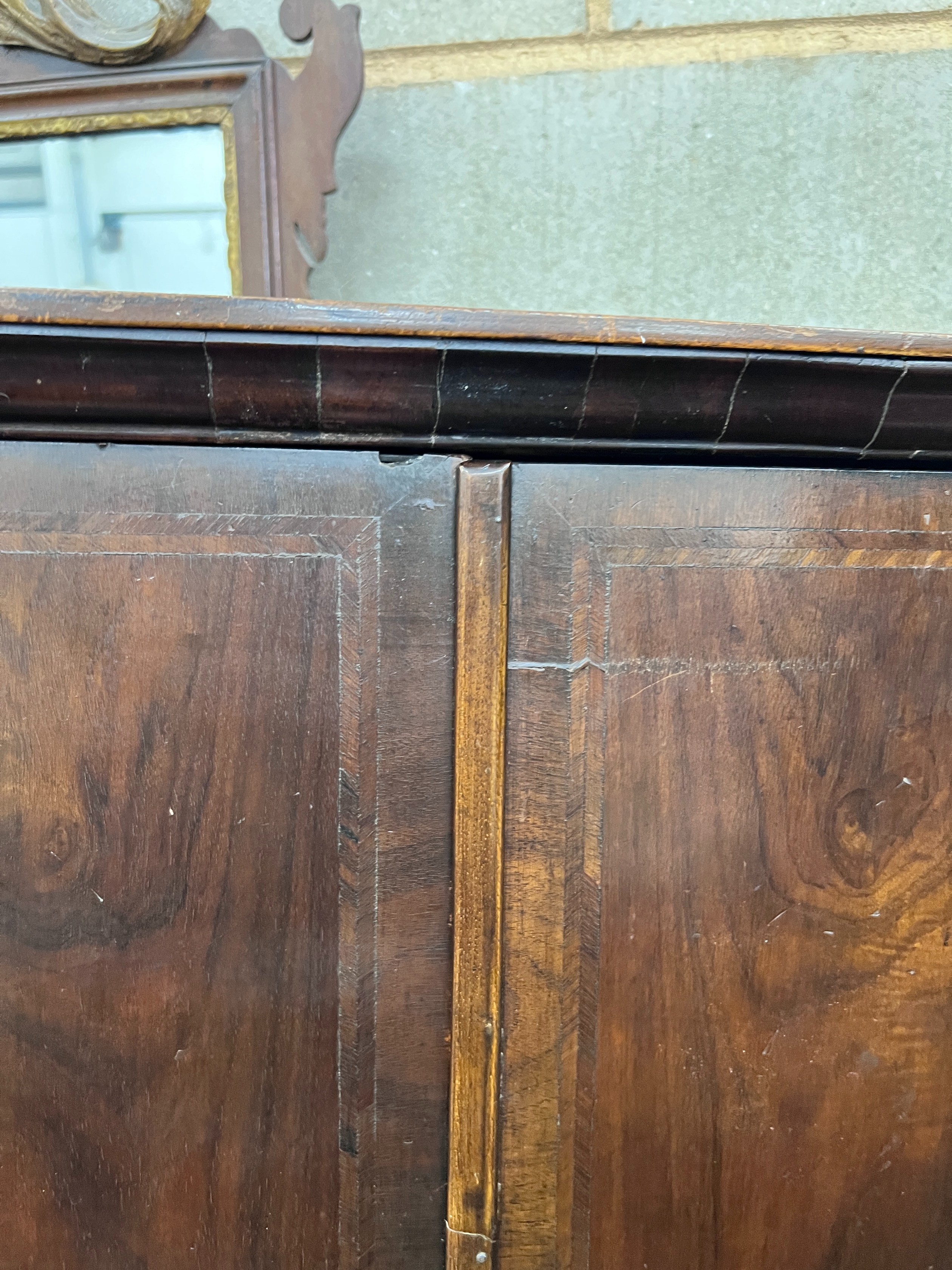 Two 18th century style hanging corner cupboards, one in oak, the other walnut, width 52cm and 70cm *Please note the sale commences at 9am.